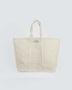 FGS Original Canvas Tote Bag – Front General Store Cheap Cream Tote Bag, Modern Canvas Shoulder Bag, Cheap Vintage White Canvas Bag, Cheap Cotton Canvas Bag For On-the-go, Luxury Chic Canvas Bag For Errands, Cheap Cream Canvas Bag For Summer, Cheap White Summer Canvas Bag, Cheap White Canvas Bag For On-the-go, Cheap Cream Canvas Bag For Beach