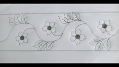 a drawing of flowers and vines on a white paper