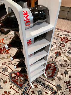 a wine rack with several bottles on it