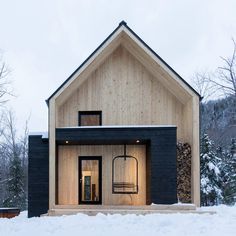 a house that has snow on the ground