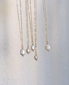 "14K gold filled chain with genuine cultured pearl. This item will not tarnish because of the 5% filled gold. Hypo-allergenic and safe for sensitive skin. Chain is 14\" long" Gold Pearl Pendant Necklace In 14k Gold Filled, Classic 14k Gold-filled Necklaces With Pearl Charm, 14k Gold-filled Necklace With Pearl Drop, Classic 14k Gold Filled Necklaces With Pearl Charm, Gold Necklaces With Pearl Drop In 14k Gold Filled, Dainty Baroque Pearl Necklace For Gifting, Gold Necklace With Pearl Drop In 14k Gold Filled, Dainty Baroque Pearl Necklace For A Gift, Everyday 14k Gold-filled Pearl Drop Necklace