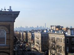 the city skyline as seen from an apartment building