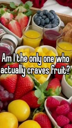 an assortment of fruits and juices with the words am i the only one who actually craves fruit?