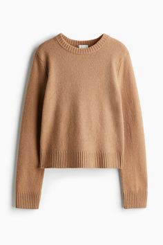 Soft  knit sweater. Round neckline  long sleeves  and straight hem. Ribbing at neckline  cuffs  and hem. Traveling Outfits, Capsule Wardrobe Pieces, Style Council, Tan Sweater, Cardigan Sweater Jacket, Vest Shirt, Beige Sweater, Girl Sweatshirts, Women Shirts Blouse