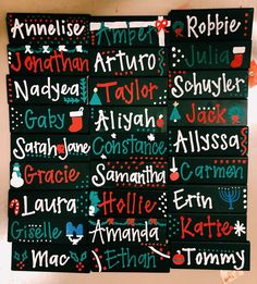 several black and red christmas cards with names on them, all written in different languages