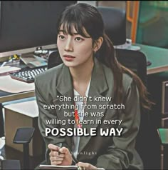 a woman sitting in front of a computer desk with a quote about possible ways to work