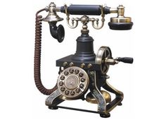 an old fashioned phone with two dials on it