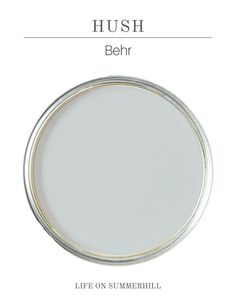 a white plate with the words hush behr written in silver on it and an image of