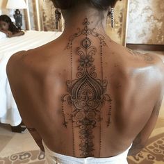 Dazzling Spine Tattoo Files Hawaiian Back Tattoo, Corset Tattoos For Women, Center Back Tattoo, Spiritual Back Tattoos, Feminine Throat Tattoos, Polynesian Tattoo Meanings, Dope Tattoos For Women