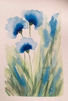 watercolor painting of blue flowers on white paper