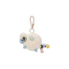 a key chain with a sheep on it