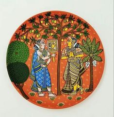 an orange plate with two people standing next to a tree