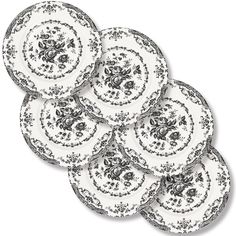 six black and white plates with flowers on them