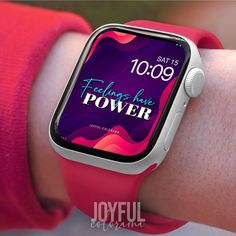 an apple watch with the text feeling like power on it's screen and a pink wristband