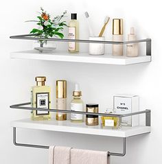 two white shelves filled with different types of cosmetics and personal care items on top of each shelf