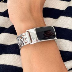 P R O D U C T ∙ D E S C R I P T I O N ∙ High Quality Premium Shiny Silver Metal Band for Fitbit Charge 5 ∙ ∙ Gorgeous Bracelet With Silver Tree Of Life Medallion ∙ ∙ Comfortable Bangle with Secure Clasp ∙ ∙ Super Light Bracelet | Weigh 1.2 oz | 18mm Wide ∙ ∙ Designed And Handmade by Simeon D Jewelry Studio ∙ ∙ Includes Extra Links and Tool to Resize Wristband To Preferred Fitment ∙ ∙ Adjustable Size Fits 5.5 to 8 Inches (need to add or remove extra links) ∙ ∙ Not For Other Models. Fitbit Activit Light Bracelet, Fitbit Charge 5, Fitbit Bands, Tech Jewelry, Smart Jewelry, Fitbit Charge, Wearable Tech, Silver Tree, Bracelet Women