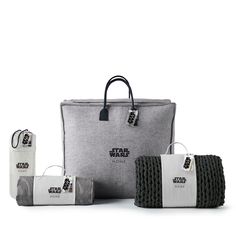 the star wars tote bag is shown with three bags and two items in it