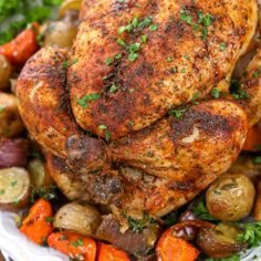 roasted chicken with vegetables on a white plate