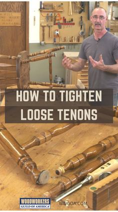 a man standing in front of a wooden table with lots of tools on top of it