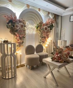 a living room filled with furniture and flowers