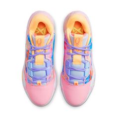 a pair of pink and blue sneakers on a white background