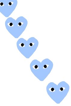 blue hearts with black eyes are lined up in the shape of a long straight line