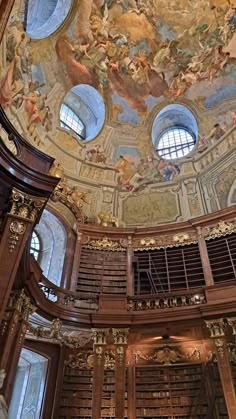 an ornate library filled with lots of books