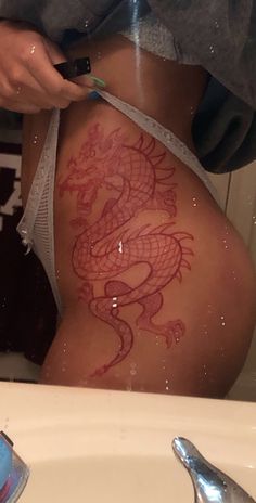 Dragon Tattoo Thigh, Simbols Tattoo, Dragon Thigh Tattoo, Side Thigh Tattoos, Hip Thigh Tattoos, Pretty Hand Tattoos, Dragon Tattoo For Women, Tasteful Tattoos, Spine Tattoos For Women