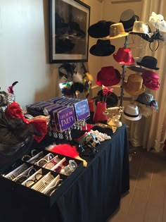 a table with hats and other items on it