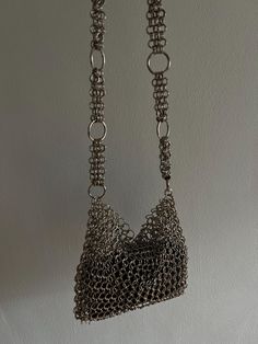 Handmade chainmail bag is made of nickel-plated silver steel rings. High about 20cm. Width about 27cm. Chain 70.5cm. Allow up to 7 days for production plus shipping time. Bag not filled with material, made of chainmail only. The photos show the bag in which the items are placed. Chainmail Fashion, Chainmail Bag, Chainmail Purse, Chainmail Clothing, Rhinestone Bag, Metal Purse, Silver Bag