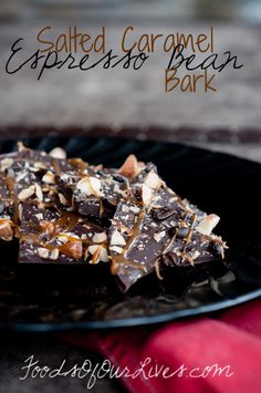 salted caramel and chocolate bark on a black plate