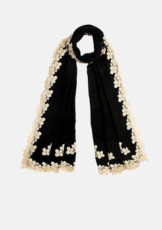 This black scarf, woven from a fine blend of silk and wool, is bordered and hand appliqued with a contrasting and delicate shiny light gold leaf-patterned lace. It is the perfect size that keeps you comfortably warm whilst making for a fashionable and contemporary accessory for any evening wear. Black Embroidered Silk Shawl, Formal Shawl With Intricate Embroidery, Elegant Pashmina Shawl With Embroidered Border For Wedding, Elegant Formal Shawl With Intricate Embroidery, Elegant Pashmina Dupatta With Intricate Embroidery, Elegant Shawl With Embroidered Border, Festive Elegant Shawl With Embroidered Border, Black Pashmina Shawl For Wedding, Elegant Formal Embroidered Pashmina Shawl