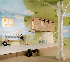 an image of a child's bedroom with a tree house on the wall and toys in the room