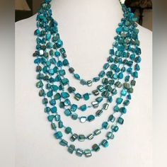 Turquoise Shell Gemstones (670.00 Cts) With Hand Knotted Silk Multi-Strand Necklace Elegant Turquoise Necklace With Gemstone Beads, Elegant Turquoise Gemstone Bead Necklace, Elegant Blue Turquoise Necklace With Polished Beads, Elegant Turquoise Gemstone Beaded Necklace, Blue Multi-strand Gemstone Beaded Necklace, Elegant Turquoise Beaded Necklace With Gemstone Beads, Elegant Blue Turquoise Necklace With Faceted Beads, Elegant Blue Turquoise Necklace With Round Beads, Elegant Multi-strand Turquoise Gemstone Necklace