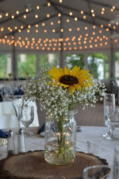 a vase filled with flowers on top of a table