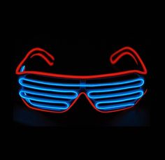 neon glasses with red and blue lights in the shape of shutters on a black background