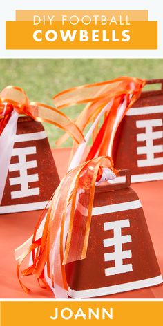 two football bags with ribbons tied around them and the words diy football cowbells