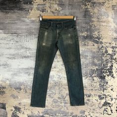 Vintage Levis 511 Denim Skinny Levis Jeans Pants - BS46535.  Manual Measurement (laying in flat area):  1) Waist: 30 inch.  2) Rise: 9 inch.  3) Hips: 18.5 inch.  4) Tight: 10 inch.  5) Outseam: 38.5 inch.  6) Inseam: 30 inch.  7) Leg opening: 6.5 inch.  Fabric Material: 100% Denim Cotton.  Condition: In good vintage condition overall.  Please check all the measurement to insyre a proper fit.  Remember to allow yourself some extra room for movement.  You can compare these information with your f Dark Wash Distressed Straight Bottoms, Fitted Faded Selvedge Bottoms, Green Denim Jeans With Five Pockets, Green Distressed Denim Bottoms, Fitted Faded Pants With Five Pockets, Faded Fitted Pants, Green Distressed Jeans, Green Denim Jeans, Dirty Jeans