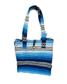 Mexican Blanket Tote Bag Handmade in Mexico Made from recycled materials Great for groceries, the beach, vacations, or as a purse! ** Each bag is handmade so there may be slight color variation from photos ** Large Blue Beach Bag For Everyday Use, Large Blue Beach Bag For Travel, Blue Shoulder Bag For Summer Market, Blue Summer Shoulder Bag, Blue Shoulder Bag For Summer, Summer Blue Handwoven Shoulder Bag, Blue Handwoven Summer Shoulder Bag, Blue Bohemian Gift Bag, Eco-friendly Blue Shoulder Bag For Travel