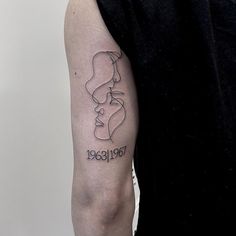 a person with a tattoo on their arm