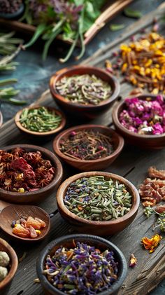 many bowls filled with different types of herbs