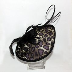 "Purple/Black/Gold sinamay leopard print headband fascinator accented with feathers. It's great with any occasions. Approximately dimension of hats: 9.5\" diameter. This piece is called Fancesca. Material: sinamay, feather, silk. Please also check other items in our store: http://www.etsy.com/shop/RepublicofPigtails?ref=si_shop" Black Feather Hair Accessories For Party, Black Mini Hats With Feather Trim For Party, Black Mini Hat With Feather Trim For Party, Black Feathered Hair Accessories For Party, Black Feathered Party Headband, Black Feathered Headband Fascinator, Chic Mini Hats With Feathers For Parties, Black Adjustable Feather Trim Headpiece, Chic Feathered Mini Hats For Races