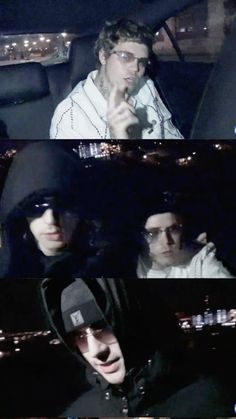 two people sitting in the back seat of a car at night and one person wearing sunglasses