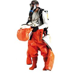 a man in an orange and white suit with gas mask on holding a red bag