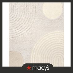 a white rug with circles on it and the words macy's written in black