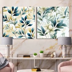 two paintings on the wall in a living room