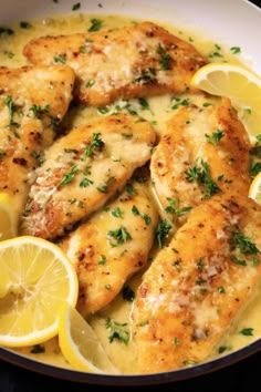 chicken with lemons and parsley in a skillet