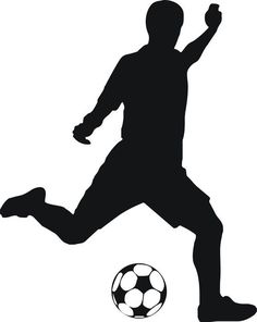 a silhouette of a man kicking a soccer ball with his foot in the air,