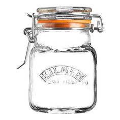 a glass jar with a metal clip on the lid and an orange rubber band around the top