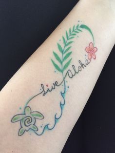 a woman's arm with a tattoo that says live aloha on it